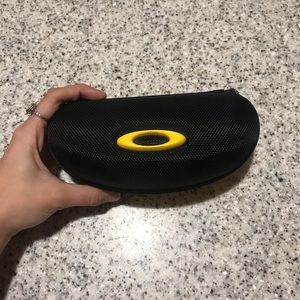 Yellow and black Oakley sports glasses